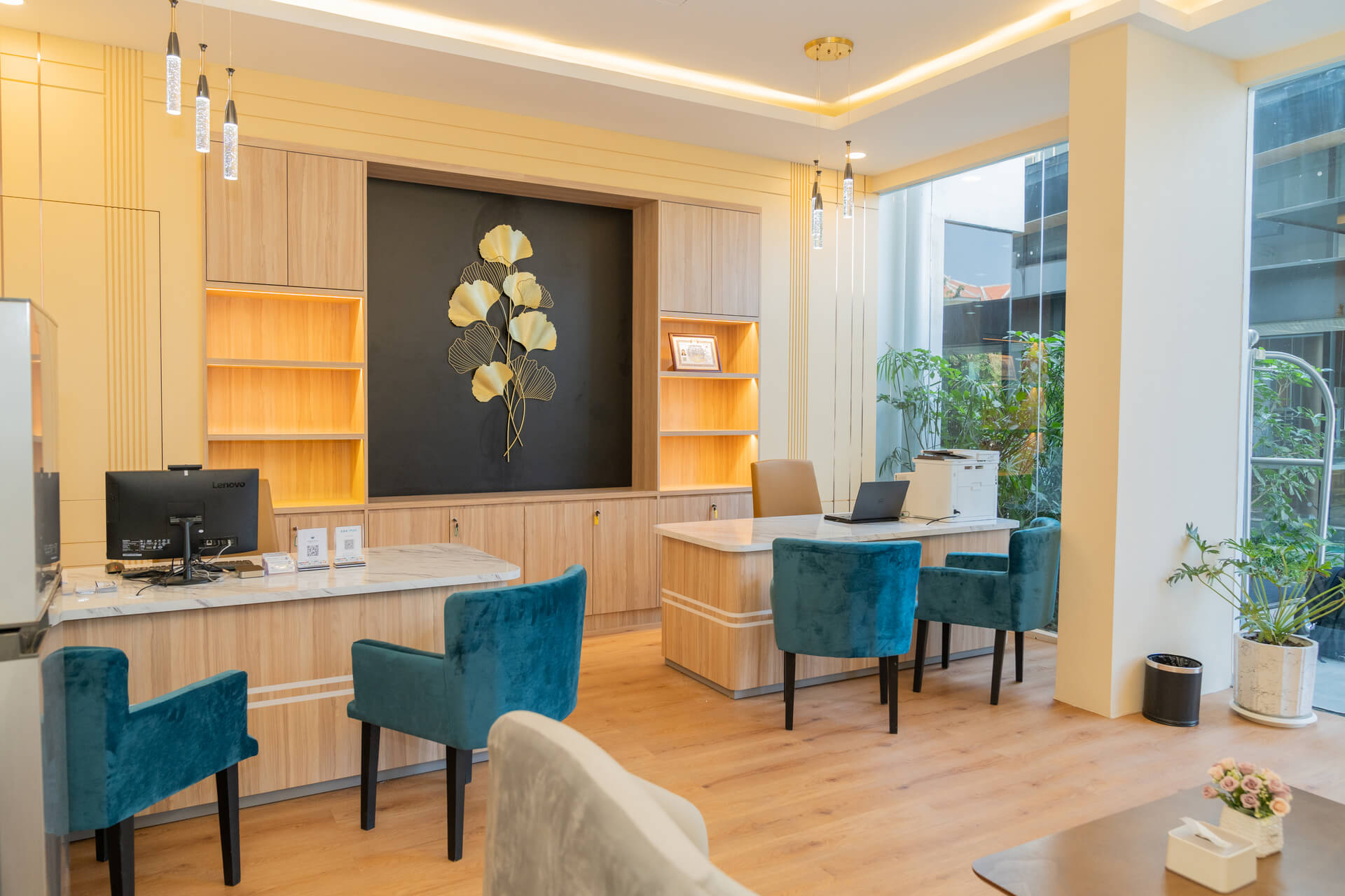 A professional and welcoming receptionist section at 85 Soho Phnom Penh, ready to assist guests with check-in and inquiries.